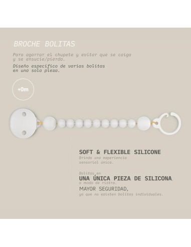 broche-pinza-silicona-bolitas-suavinex-4.jpg – Producto en uso sujeto a ropa.