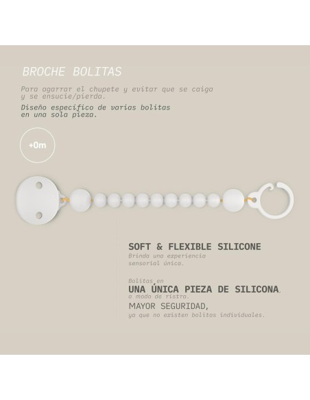 broche-pinza-silicona-bolitas-suavinex-4.jpg – Producto en uso sujeto a ropa.